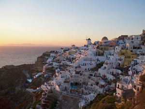 Sunset sky over view of Oia in Santorini, Greece 