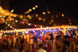 Young travellers at beach party