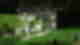 Green hills with small barbed wire fence with animal cut-outs and the words 'DMZ'