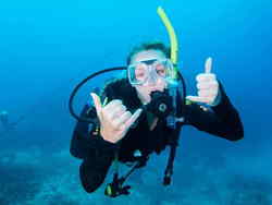 Girl learning to scuba dive