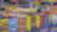 Rainbow coloured port filled with vibrant buildings stacked close to each other and lots of cars