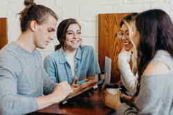 Group of young professionals at work in office