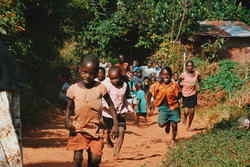 Group of happy children running