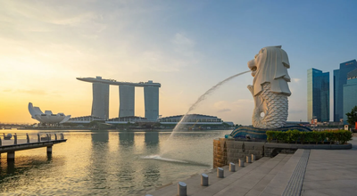 Merlion Park with sunrise in singapore city